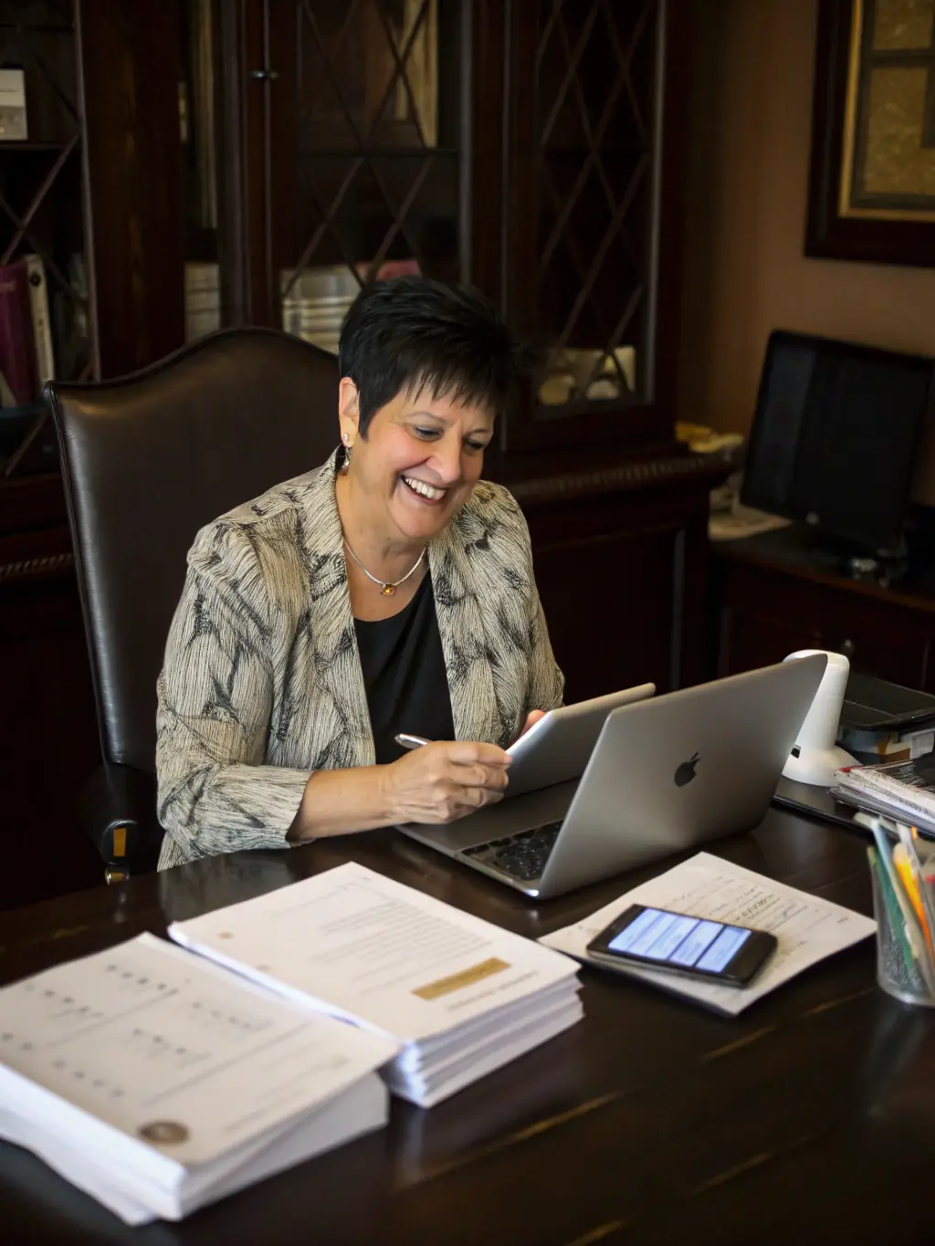 A business coach providing one-on-one mentorship to a young entrepreneur, offering guidance and support in navigating the challenges of starting a business.